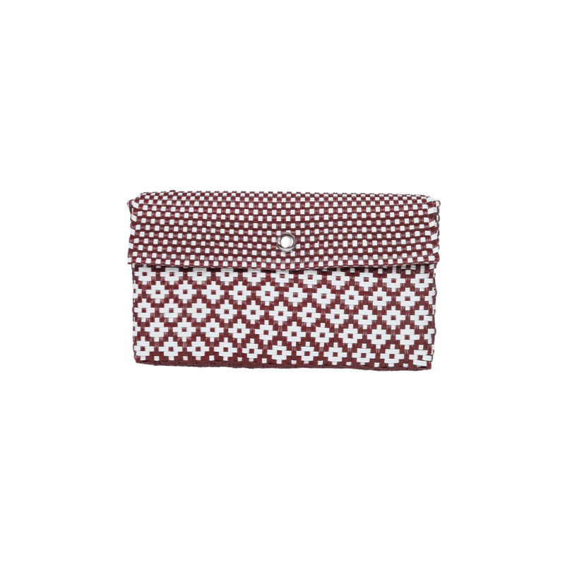 Bolsa artesanal de palma de toquilla tejida a mano por artesanas de Oaxaca, elaborada con fibra natural y técnicas tradicionales de tejido.