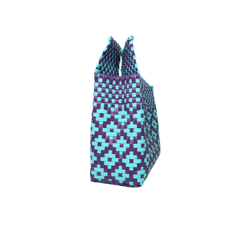 Bolsa artesanal de palma de toquilla tejida a mano por artesanas de Oaxaca, elaborada con fibra natural y técnicas tradicionales de tejido.