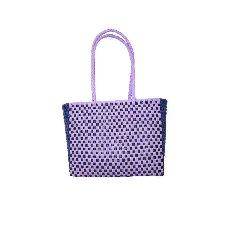Bolsa artesanal de palma de toquilla tejida a mano por artesanas de Oaxaca, elaborada con fibra natural y técnicas tradicionales de tejido.