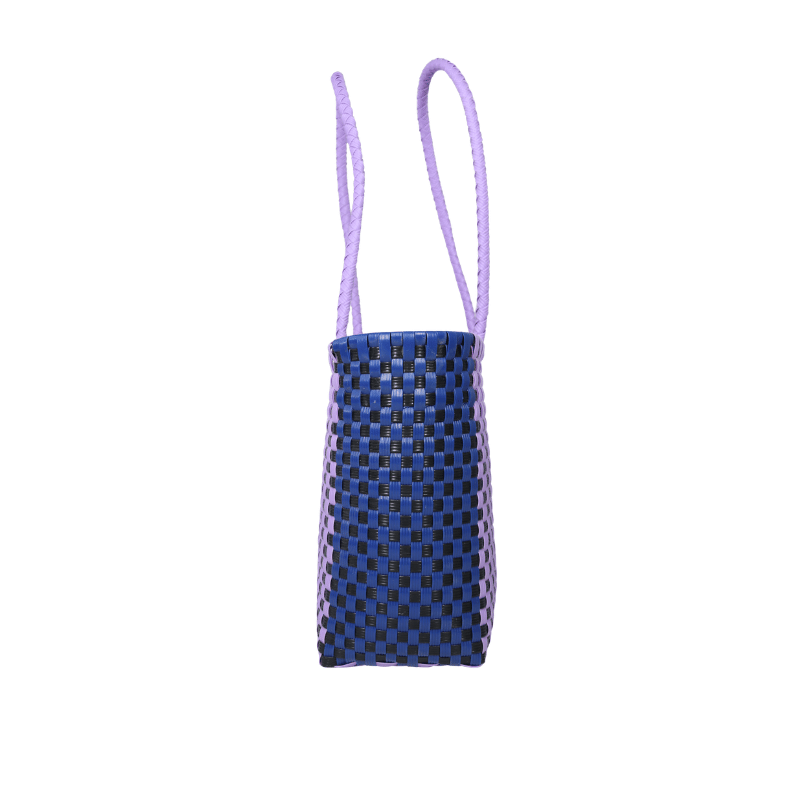 Bolsa artesanal de palma de toquilla tejida a mano por artesanas de Oaxaca, elaborada con fibra natural y técnicas tradicionales de tejido.
